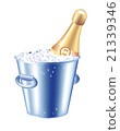 Bottle of champagne in an ice bucket 21339346