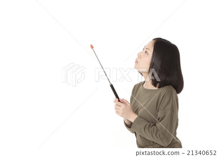 A young lady with an instruction stick 21340652