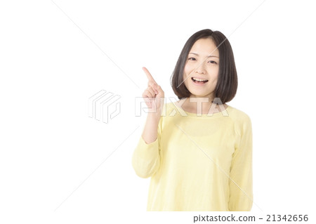 A young lady with pointing pose 21342656