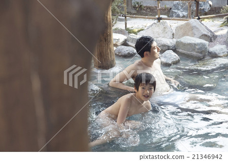 Parent and child entering outdoor bath Parent and child entering outdoor bath 21346942