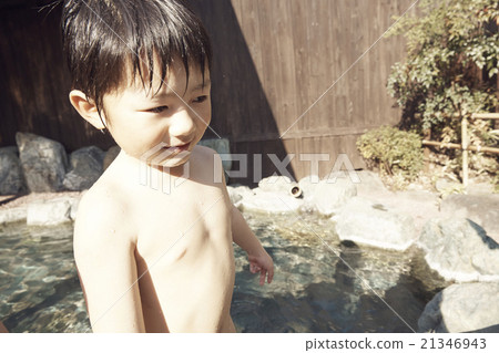 Child entering outdoor bath Child entering outdoor bath 21346943