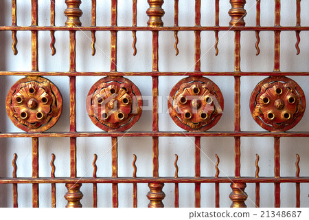 Old metal Iron gate behind the white wall Old metal Iron gate behind the white wall 21348687