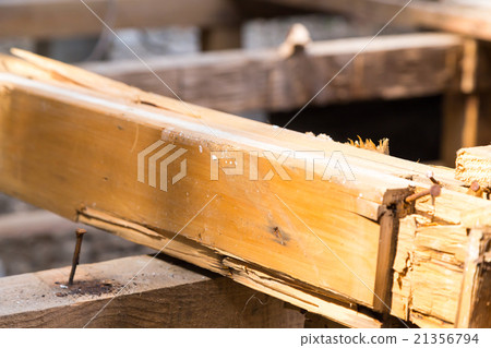 Floorboard foundation laying house demolition trader semi-destructive building to destroy houses dismantling work wood waste material disrupting Japanese architecture 21356794