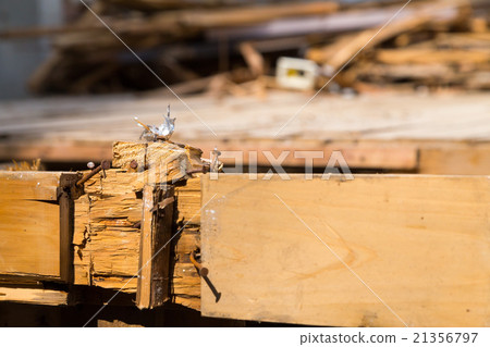 Floorboard foundation laying house demolition trader semi-destructive building to destroy houses dismantling work wood waste material disrupting Japanese architecture 21356797