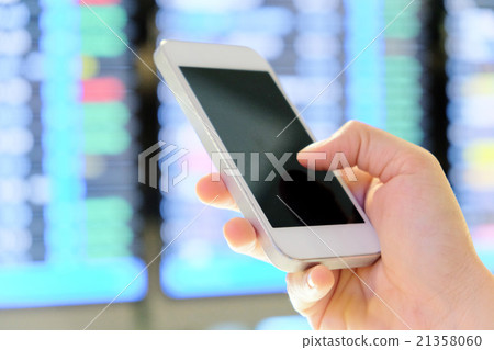 hand holding smartphone  hand holding smartphone  21358060