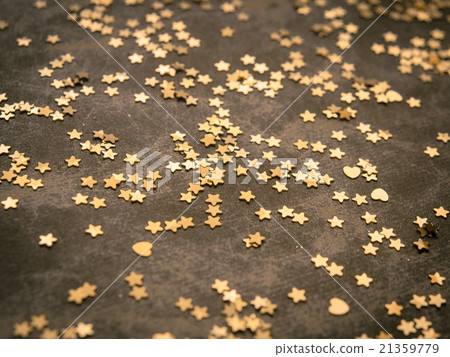 Golden stars on dark brown background Golden stars on dark brown background 21359779