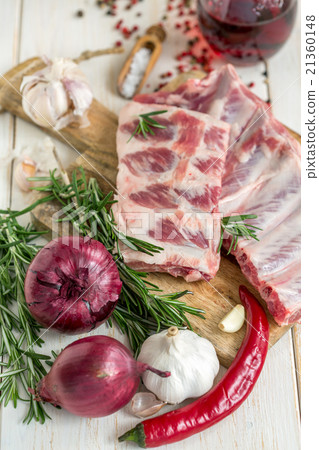 Vegetables,rosemary, pork ribs and red wine. 21360148
