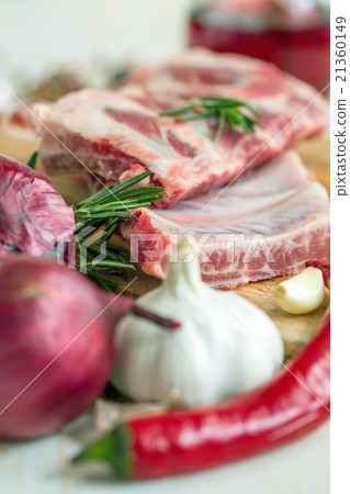 Pork ribs with rosemary. 21360149