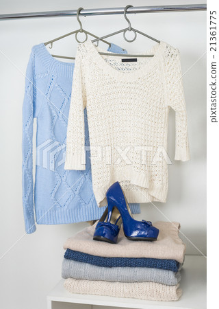 Women's warm knitted things in the white cupboard Women's warm knitted things in the white cupboard 21361775