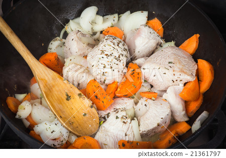Cooking turkey with vegetables 21361797