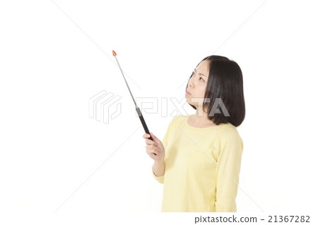 A young lady with an instruction stick A young lady with an instruction stick 21367282