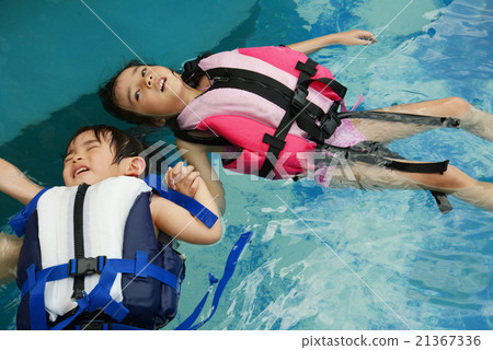 Sister in swimming training 21367336