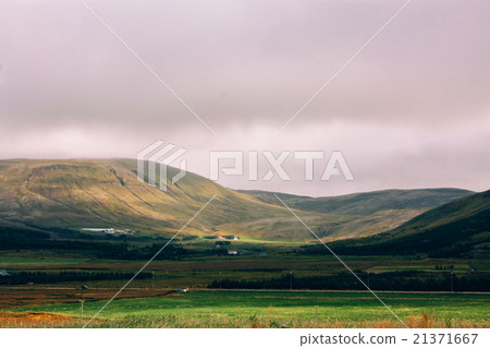 Icelandic landscape of green mountains 21371667