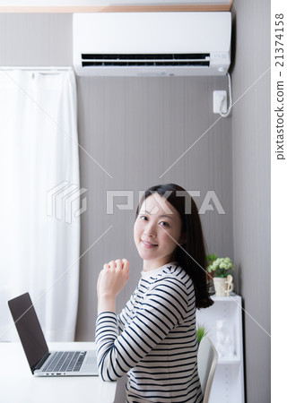 Air conditioner lady computer 21374158