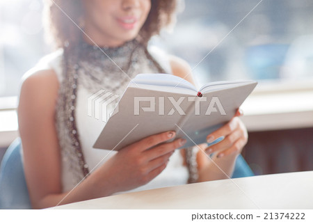 Pleasant girl reading book Pleasant girl reading book 21374222