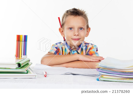 Cute school boy with pencil behind his ear 21378260