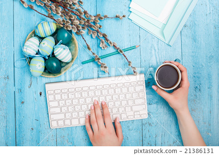 The top view of easter on wooden table office The top view of easter on wooden table office 21386131