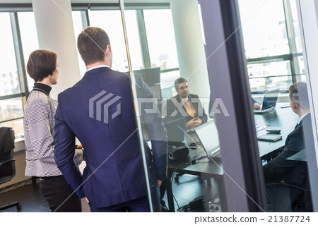 Corporate business team office meeting. Corporate business team office meeting. 21387724