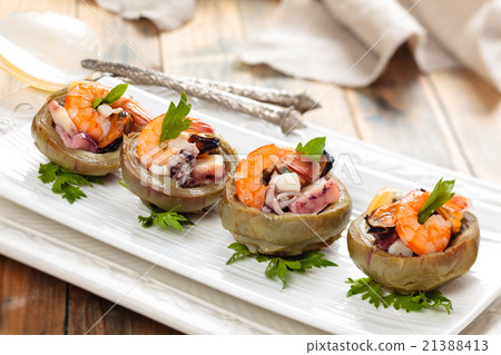 Stuffed artichoke hearts. Stuffed artichoke hearts. 21388413
