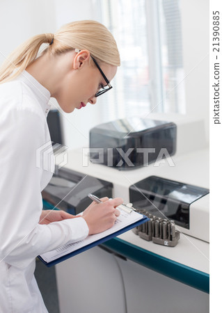 Skillful young scientist is making report of work 21390885