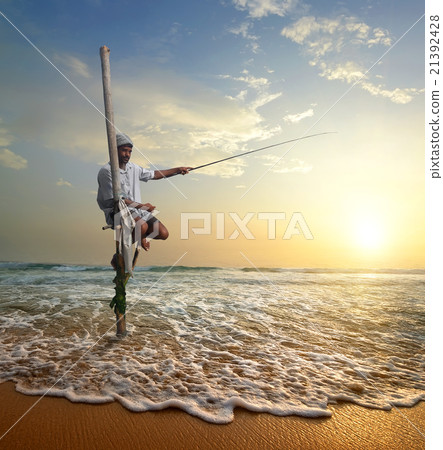 Fisherman at sunset 21392428