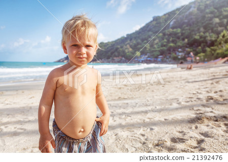 Portrait of little toddler on a beach Portrait of little toddler on a beach 21392476