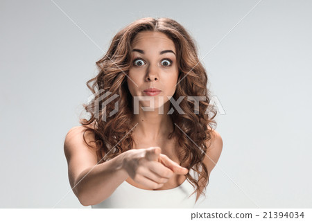 The happy woman on gray background The happy woman on gray background 21394034