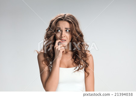 The young woman's portrait with frightened The young woman's portrait with frightened 21394038