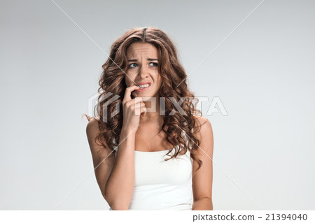 The young woman's portrait with frightened The young woman's portrait with frightened 21394040