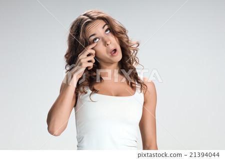 The young woman's portrait with bored emotions 21394044