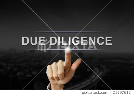business hand pushing due diligence button 21397612