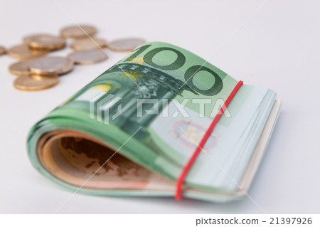 Euro banknotes. and  coins. Rolled euro money 21397926