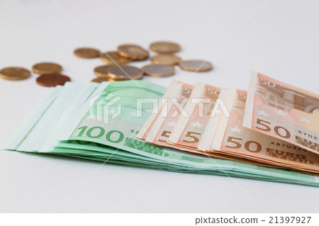 close up of euro currency. coins and banknotes close up of euro currency. coins and banknotes 21397927
