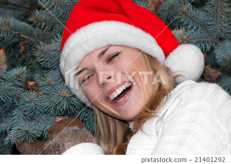 Portrait beauty girl in santa red cap Portrait beauty girl in santa red cap 21401292