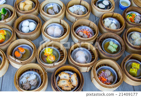 various dim sum in bamboo steamer  21409177