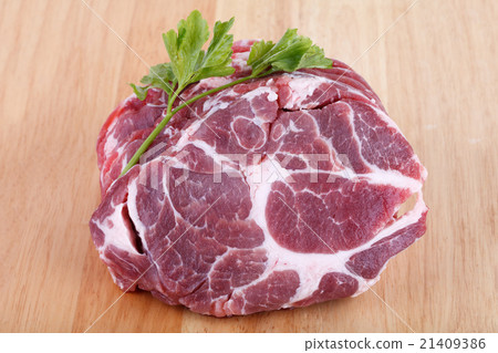 Fresh crude pork neck meat steak on wood Fresh crude pork neck meat steak on wood 21409386