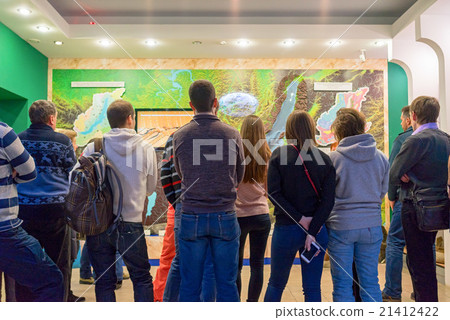 rear view of people in museum 21412422