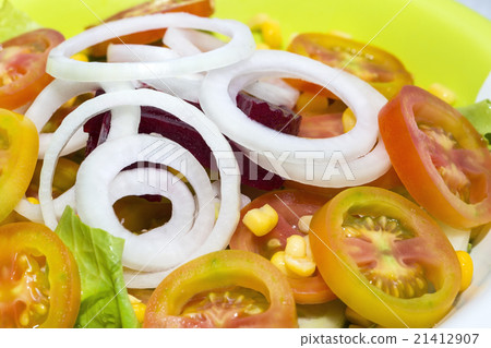 fresh vegetable salad tomato onion and lettuce 21412907