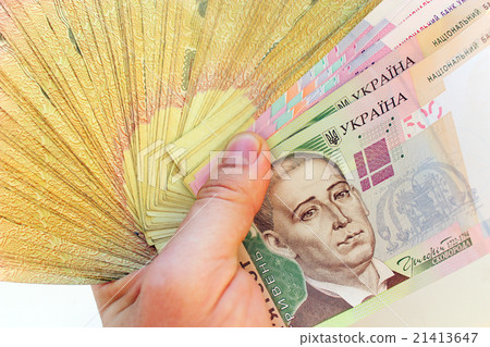 Ukrainian money in the hand Ukrainian money in the hand 21413647