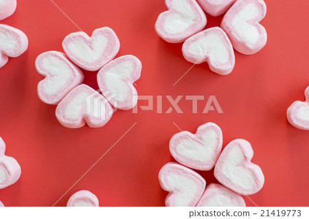 Arrange pink heart marshmallows as sakura flowers 21419773
