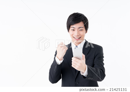 A young businessman (smartphone) A young businessman (smartphone) 21425131