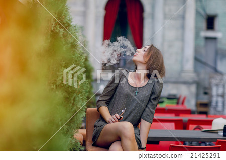 girl with E-cigarette 21425291