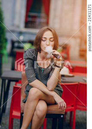 girl with E-cigarette girl with E-cigarette 21431171