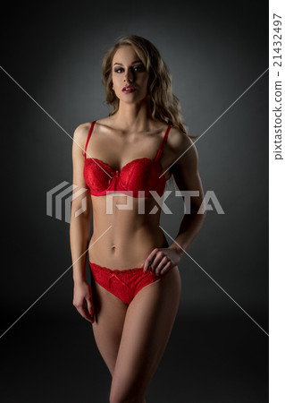 Underwear catalog. Sexy model in hot pink lingerie 21432497