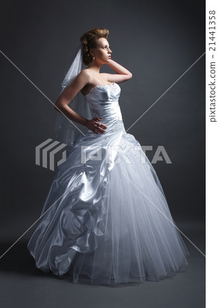 young beautiful bride in wedding dress 21441358