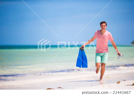 Young man with mask and fins. Holiday vacation on 21441667