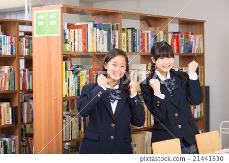 Junior high school students playing guts pose at the library Junior high school students playing guts pose at the library 21441830