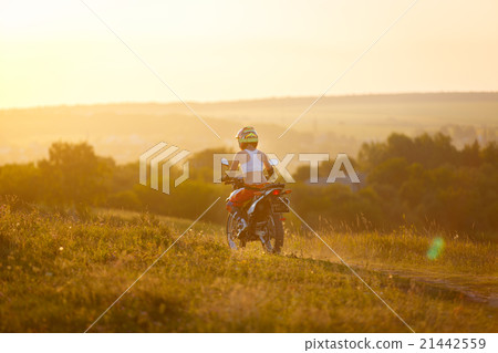 Woman biker in sunset, female motorcycle. Woman biker in sunset, female motorcycle. 21442559