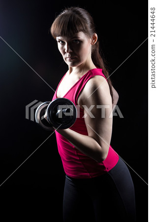 Serious athlete with kettlebell 21444648