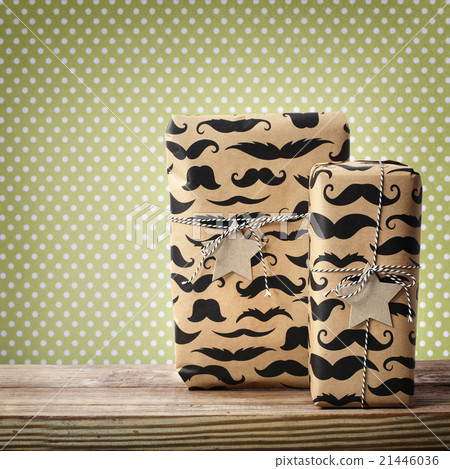 Mustache pattered gift boxes with star shaped tags 21446036
